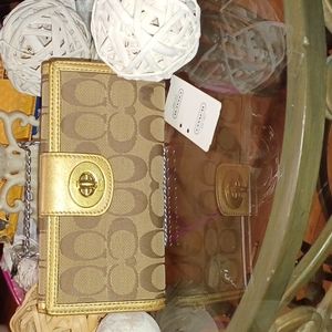 GOLD COACH WALLET WITH TAG